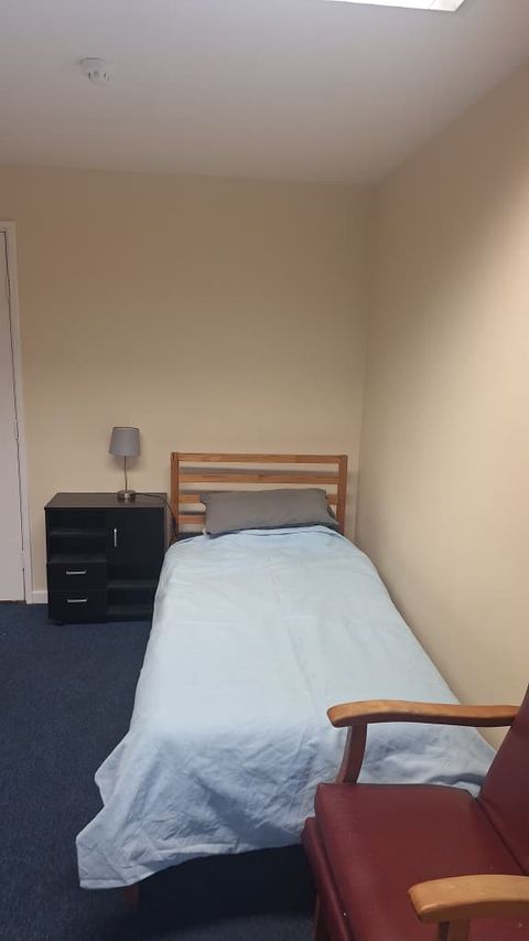 A furnished bedroom at the SAIL property